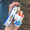 Cute Hello Kitty 3D figure keychain with blue dress and white rubber wrist strap - Hello Kitty-Blue Floral Skirt