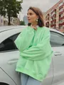 Oversized neon green crewneck sweatshirt featuring a relaxed fit for street style - S / Mint Green