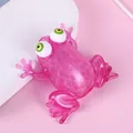 Close-up of pink translucent frog squeeze toy with bulging eyes and water beads - Bead Frog - Rose Red / 9.5x7.5x3.7