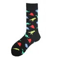 Macro view of black crew socks with vibrant, colorful dinosaur silhouette patterns. - US 5 / One Size