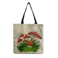 Detailed front view of a linen tote bag with colorful mushroom and grass print - Red-topped Mushrooms and Grass (hm0372)