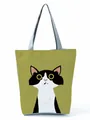 Close-up of a stylish tote bag featuring a cute black and white cartoon cat print - Morandi Green Cat Print (hl3548)