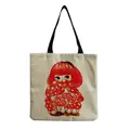 Close-up view of a cute mushroom girl cartoon print on a natural linen canvas tote bag - Red & Yellow Mushroom Girl (hm0836)