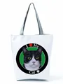 Detail view of white tote bag featuring a cute black and white tuxedo cat print - Round Badge Cat Print (hl3559)