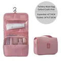 Pink Oxford hanging toiletry bag with handle and large capacity travel storage compartments. - Pink (makeup Bag)