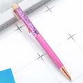 Creative pink metal ballpoint pen with purple glitter sand hourglass design and rose gold trim - 1.0mm Bullet Tip / Purple
