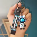 Detailed macro view of a cute astronaut rabbit keychain with starry sky visor and strap. - Roaming Four-Section Chain Style / Blue