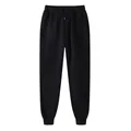 Essentiële zwarte fleece joggingbroek met elastische trekkoord en geribde boorden. - S / Zwart