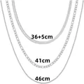 Set of three layered silver-tone chains featuring snake and Figaro styles in varying lengths - Flat Snake Chain, Figaro Chain and Fine Round Snake Chain Stacked (12 Silver) / 36cm+41cm+46cm+5cm / Silver