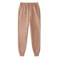 Cozy fleece-lined joggers in dusty rose with elastic drawstring waist and ribbed cuffs - Camel