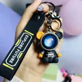 Starry sky space astronaut bear keychain with galaxy visor and Explore Future strap - Roaming Sitting Bear / Gray