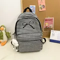 Stylish black and white checkered school backpack with bow detail and cloud charm - Black with Cloud Charm