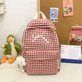 Red and white checkered student backpack featuring white bow detail and cloud plush charm - Pink with Cloud Charm