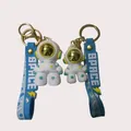 Cute astronaut keychain pair with blue SPACE silicone wrist strap and golden mirror helmet - Astronaut [6cm] / Green