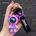 Creative purple astronaut bear figurine keychain with Mask print silicone strap detail - Lightning Bear [7.2cm] / Purple