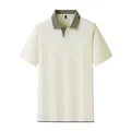 Lässiges Herren-Polohemd in Cremeweiß mit kontrastierendem grünem Kragen - M / Elfenbein