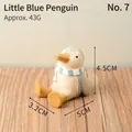 Cute sitting penguin resin figurine wearing a scarf, decorative animal home ornament - Blue Little Penguin (7)