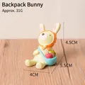 Adorable resin rabbit figurine with orange polka dot hat and blue backpack, SKU 29 - Backpack Bunny (29)