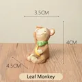 Cute miniature resin monkey figurine holding a banana for home garden desk decor - Monkey With Leaf (47)
