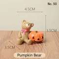 Hand-painted resin bear figurine with a smiling Halloween pumpkin ornament, 4.5cm - Pumpkin Bear (50)