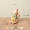 Handcrafted resin monkey figurine wearing a red Christmas hat and scarf for home garden decor - Monkey With Red Hat (48)