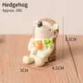 Cute resin hedgehog figurine holding a mushroom, 3.5cm tall, decorative garden ornament - Hedgehog (70)