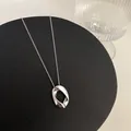 Elegant minimalist silver-toned oval hollow pendant necklace for women daily casual wear - Silver