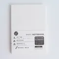 Minimalistisch wit A5-notitieboek met draadbinding, perfect voor dagboek en planning - Geliniëerd / A5
