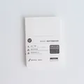 Minimalist A6 grid notebook refill with white paper sleeve for journaling and notes - Grid Pattern / A6