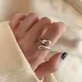 Minimalist S925 sterling silver lava-style open ring shown on finger - Adjustable Open / Water Drop