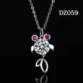 Elegant Moissanite-style pendant necklace featuring pink stone accents and a silver chain - Abstract Animal Style with Pink Eyes (DZ059)
