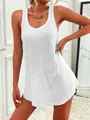 Model wearing white sleeveless U-neck racerback tank mini dress in indoor setting - S / White