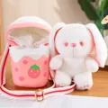 Süßes weißes Plüschhasen-Spielzeug mit rosa Erdbeer-Umhängetasche für Mädchen. - 20cm / Milchtee Hase Puppe / 【produktmerkmale】dieses Produkt Besteht Aus Einem Set Aus Einem Bezaubernden Weißen Plüschhasen Und Einer Passenden Rosa Plüsch-umhängetasche. Der Hase Hat Charakteristische Lange Ohren Rosa Paillettenaugen Und Zart Bestickte Pfotenballen Und Fühlt Sich Flauschig An. Die Umhängetasche Ist Im Beuteltaschen-stil Gehalten Und Mit Einem Auffälligen Erdbeermuster Auf Der Vorderseite Sowie Einem Rot-weiß Gestreiften Schultergurt Aus Gurtband Versehen. Dieses Set Eignet Sich Sowohl Als Spielzeug Für Kinder Als Auch Als Lässiges Geschenk Für Mädchen. 【visuelle Präsentation】das Bild Ist Ein Produktbild Mit Einer Ausgewogenen Und Harmonischen Komposition. Das Produkt Ist Auf Einer Warmen Hellen Holzplatte Platziert Im Hintergrund Befinden Sich Pflanzen Und Zeitschriften Die Für Eine Sanfte Beleuchtung Sorgen. Die Bildschärfe Ist Hoch Und Die Textur Ist Exzellent. Die Ästhetik Ist Hoch Mit Einer Gesamtbewertung Von 85 Einem Stimmigen Gesamtbild Und Einer Harmonischen Farbgebung. 【textinhalt】die Magazinseite Am Unteren Rand Enthält Einen Kurzen Englischen Text (prop_text) Der Nicht Gegenstand Der Prüfung Ist Und Keiner Bearbeitung Bedarf. Das Bild Enthält Keine Wasserzeichen Oder Chinesische Werbebegriffe. 【logistikhinweise】keine. 【rechtsverletzungsrisiko】produktverletzung: Keine Da Es Sich Um Ein Allgemeines Design Handelt. Hintergrundverletzung: Keine. [produktparameter] Enthält 1 Hasen-plüschtier Und 1 Erdbeer-plüschrucksack.