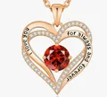 Close-up of rose gold double heart necklace with red birthstone and sweet engraving. - January - Rose Gold