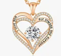 Close-up of elegant rose gold double heart pendant with engraved I love you message - April - Rose Gold