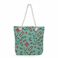 Spacious tote bag with nurse-themed medical prints and durable rope handles - Mint Green Medical Equipment Repeat Style (ms4552)