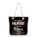 Large black canvas tote bag featuring My Favorite Nurse Calls Me Mom graphic design print - Black My Favorite Nurse Mom Quote Style (ms4560)