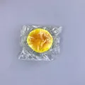 Gelbes PU Slow Rebound Simulations-Brot-Quetschspielzeug in klarer Kunststoffhülle - Einzelnes Mittelgroßes Eierkuchen (im Opp-beutel) 7 Cm Durchmesser