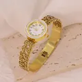 Elegant gold stainless steel bangle watch with crystal bezel and intricate floral cutouts - Clover Hollow Style (B01903)