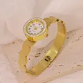 Detailed close-up of golden titanium steel bangle watch with crystal bezel - Honeycomb Texture Style (B01751)