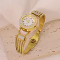 Elegant gold stainless steel bracelet watch with crystal bezel and quartz dial. - Triple-Line Hollow Rhinestone Style (B01599)