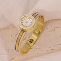 Detailed view of elegant gold-toned bangle watch with rhinestone bezel and screw motif - Screw Design Style (B01741)