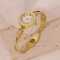 Elegant gold-tone stainless steel bangle watch featuring a crystal-set bezel and dial - Hollow Cross Style (B01744)