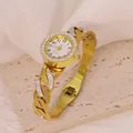 Detail of elegant gold-toned stainless steel bracelet watch with rhinestone accents. - Hollow Chain Style (B01745)