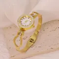 Elegant gold titanium steel bangle watch featuring a sparkling rhinestone bezel design - Hollow Geometric Style (B01333)