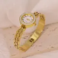Elegant gold-tone titanium steel bracelet watch featuring a sparkling crystal-set bezel - Triple-Row Oval Hollow Style (B01338)
