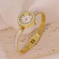 Elegant gold stainless steel bangle watch with sparkling crystal embellishments - Rhinestone Bangle Style (B01390)