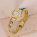 Elegant gold stainless steel bangle watch with turquoise stones and sparkling crystals. - Turquoise Decor Style (B01445)