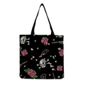 Detail view of the gothic skull and pink rose print pattern on a black canvas tote bag - Punk Gothic Style Skull and Pistols Pattern (hm6638)