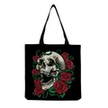Detailed close-up view of gothic skull and red rose print on a black canvas tote bag - Realistic Skull and Red Rose Vines Art (hm6640)